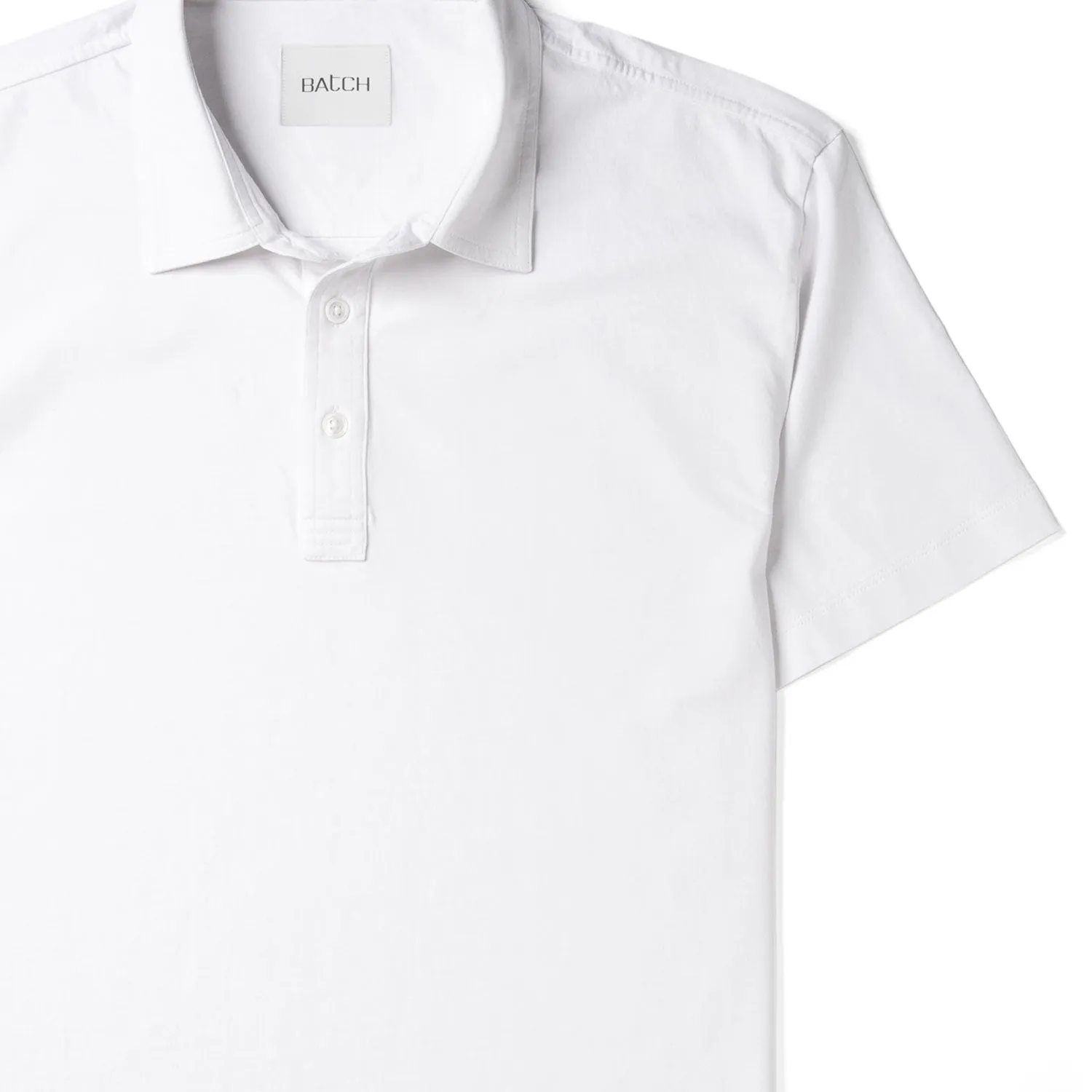 Essential Short Sleeve Curved Hem Polo Shirt –  Pure White Cotton Jersey